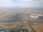 2014-05-07 16 23 15 View of New York City, Secaucus, New Jersey, the Hackensack River, the New Jersey Turnpike Western Spur and New Jersey Route 3 from an airplane heading for Newark Liberty International Airport